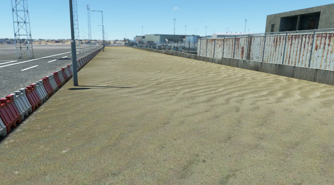 Rugged sand and rock terrain around an airfield with REX Real Global Airport Textures