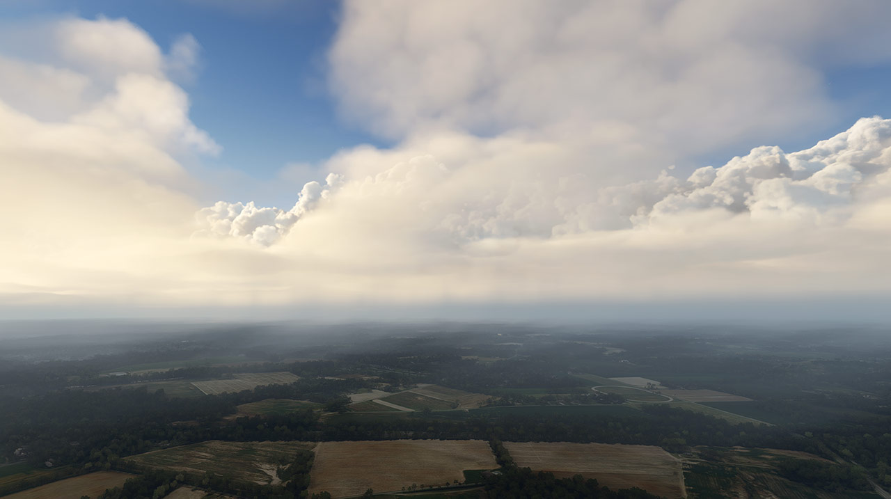 Drone view of terrain and clouds