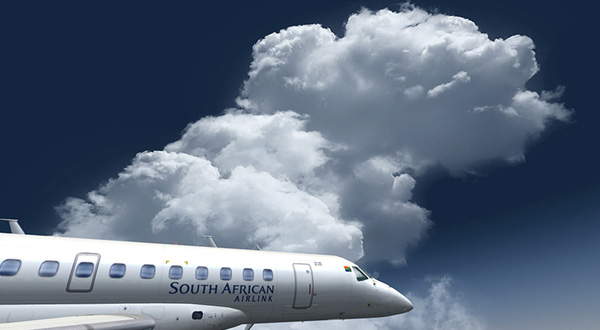 A white airplane soaring through the sky.